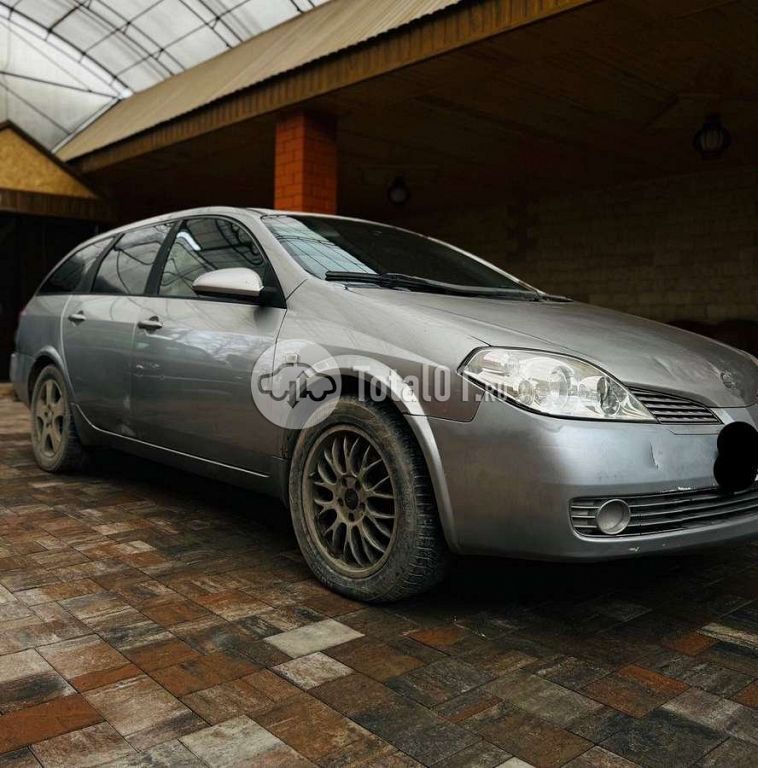 Фото Nissan Primera 6