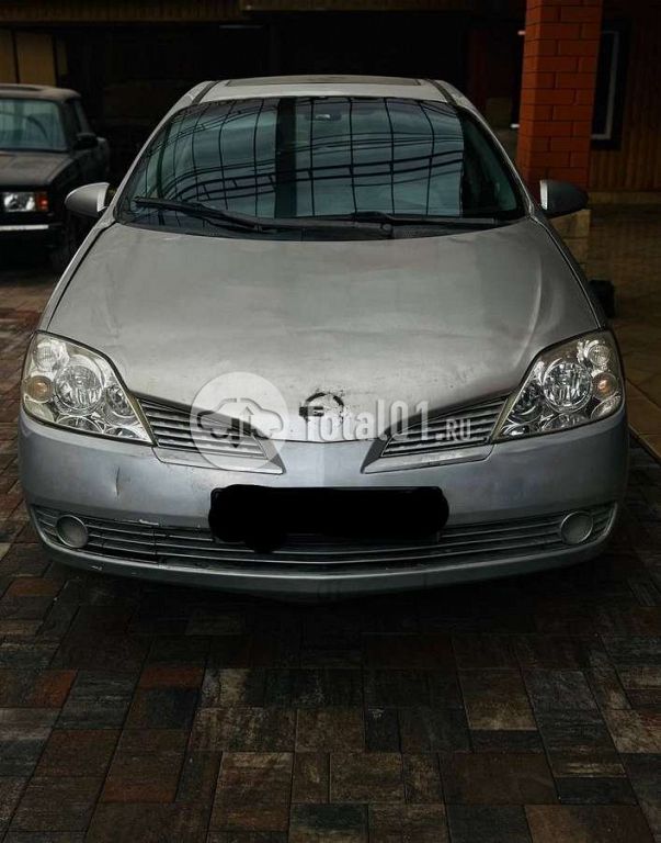 Фото Nissan Primera 16