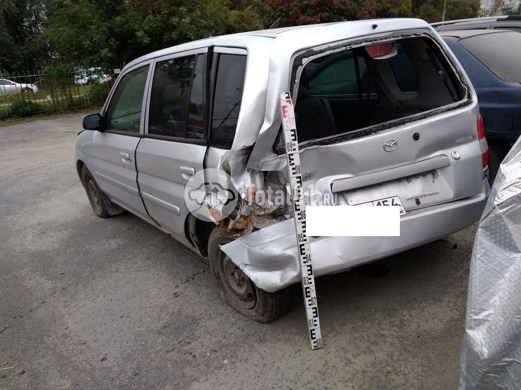 Фото Mazda Demio 12
