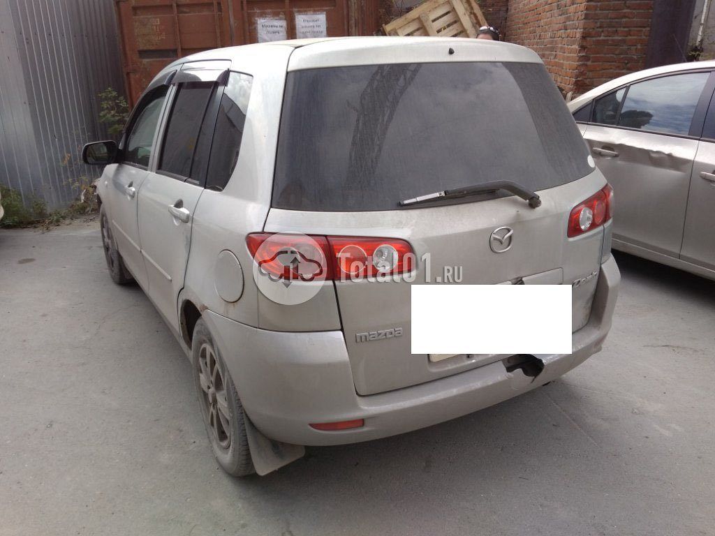 Фото Mazda Demio 10