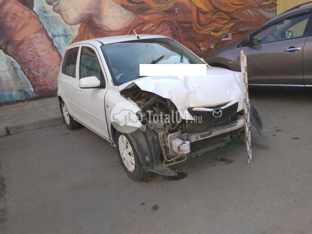 Фото Mazda Demio 12