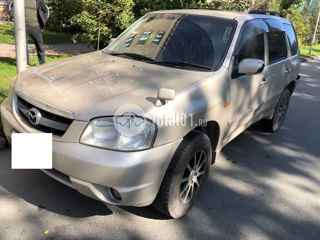 Фото Mazda Tribute 10