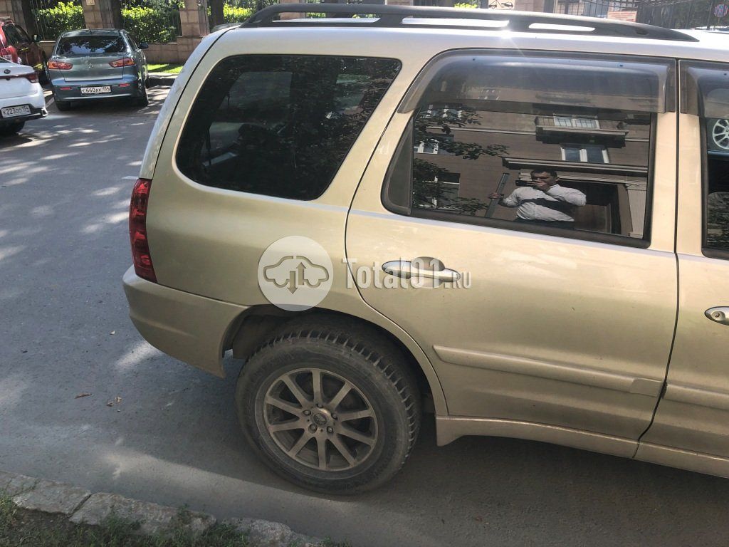 Фото Mazda Tribute 36