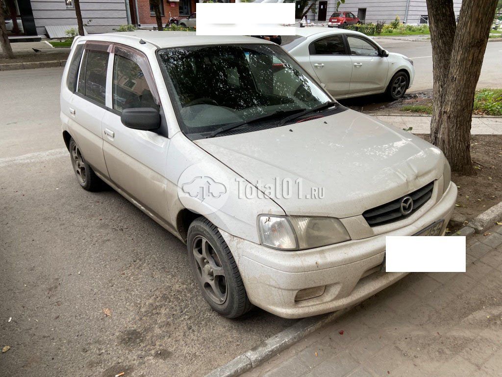 Фото Mazda Demio 22
