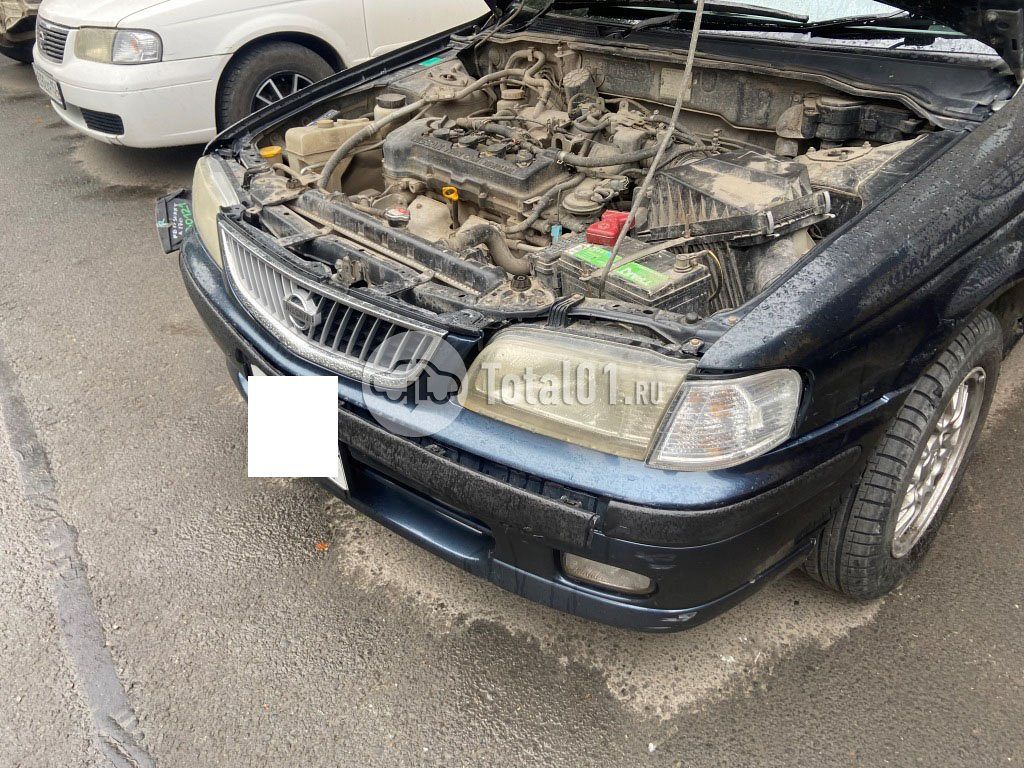 Фото Nissan Sunny 212