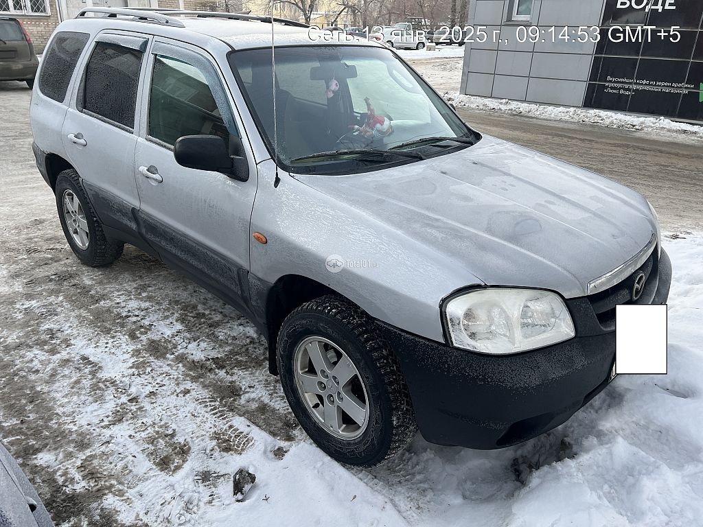 Фото Mazda Tribute 2