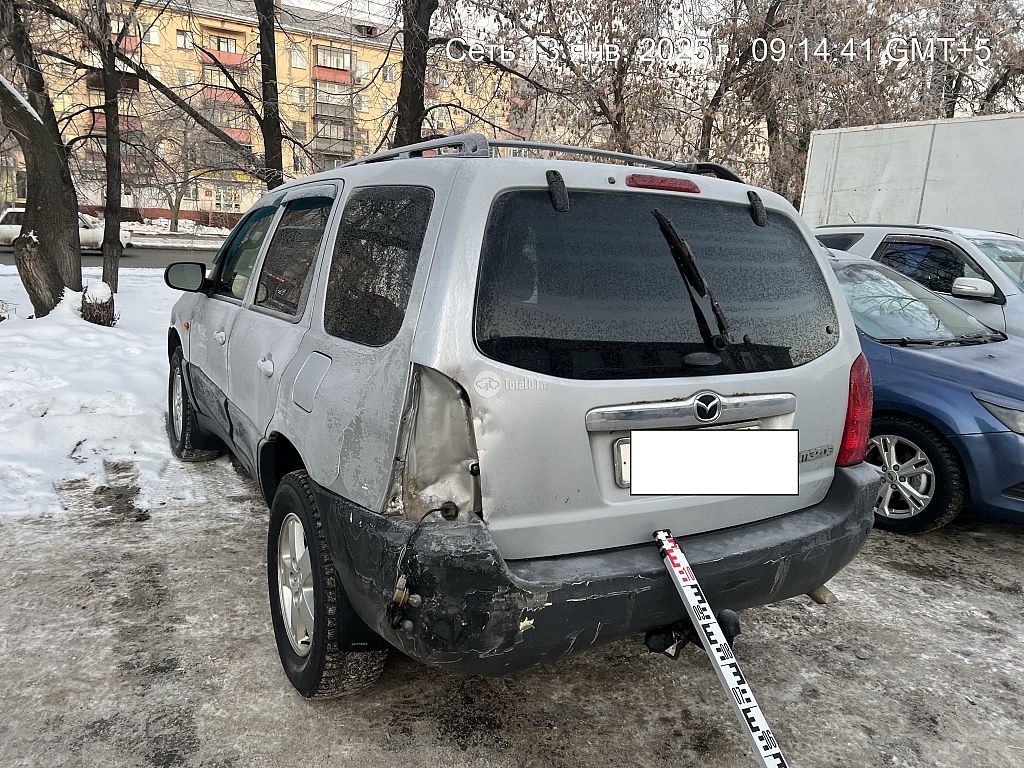 Фото Mazda Tribute 10