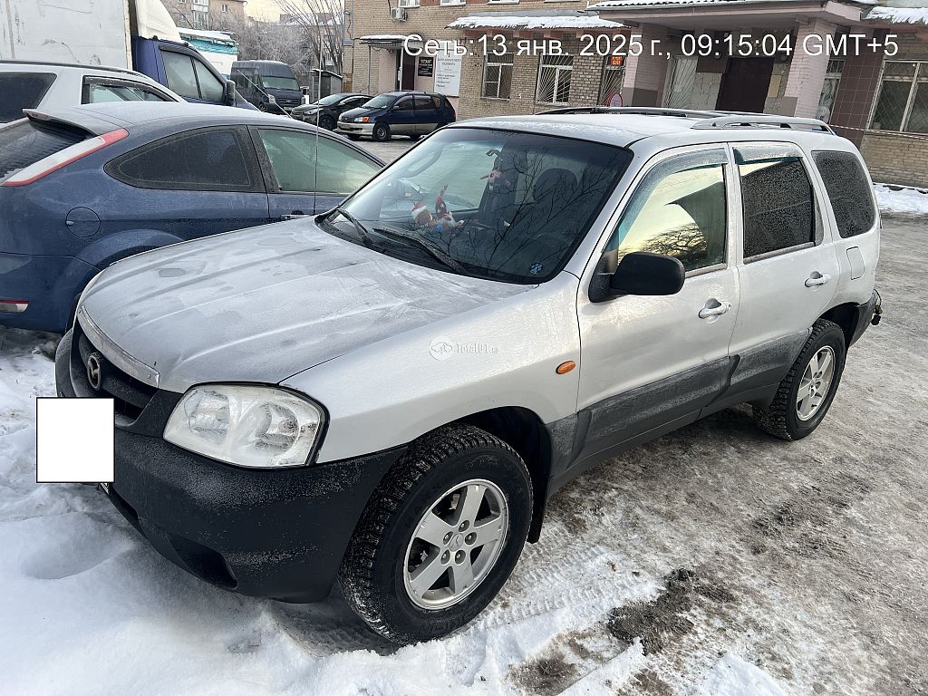 Фото Mazda Tribute 14