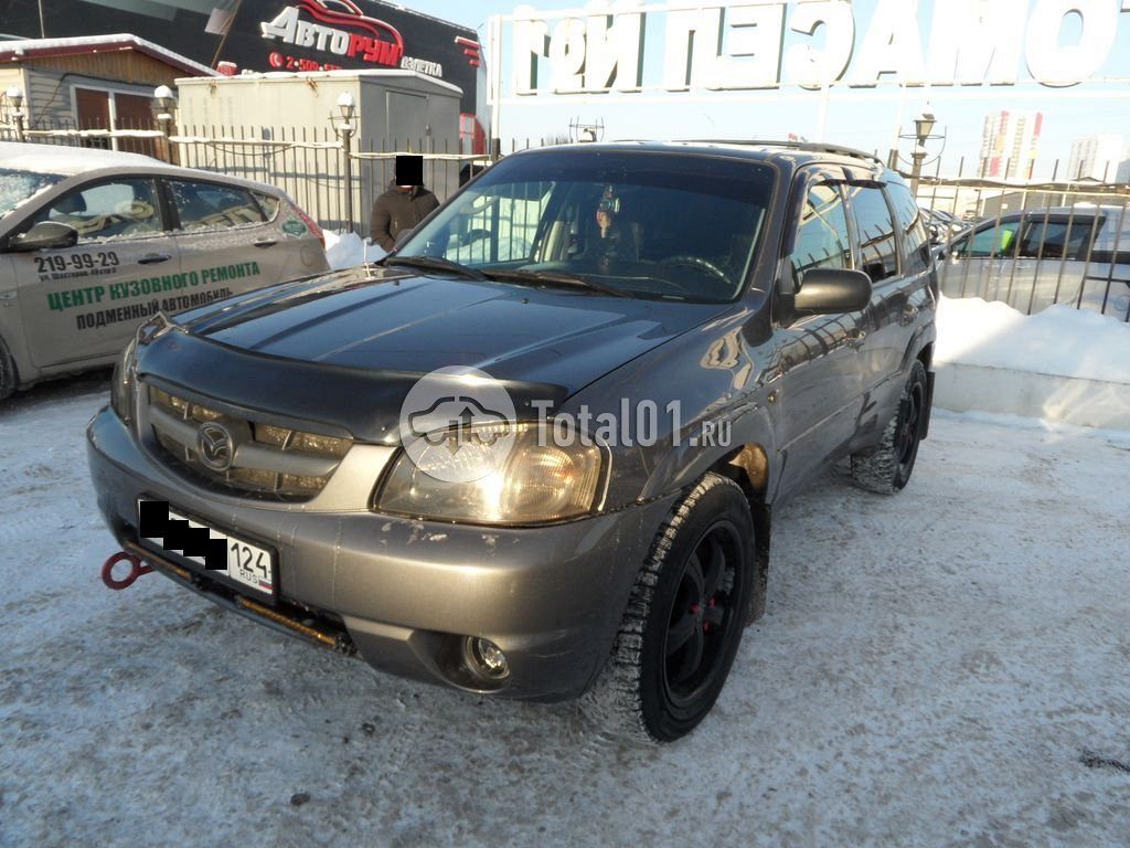 Фото Mazda Tribute 8