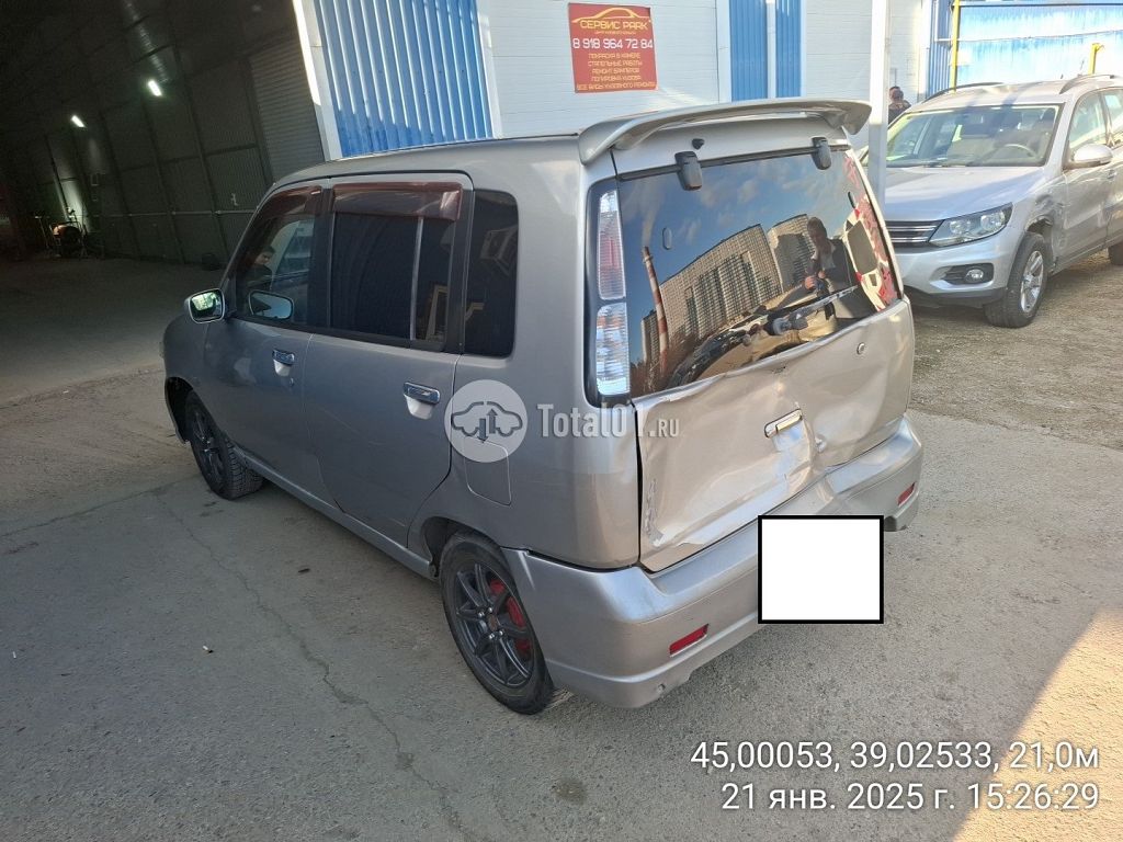 Фото Nissan Cube 12