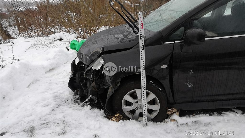 Фото Nissan Tiida 26