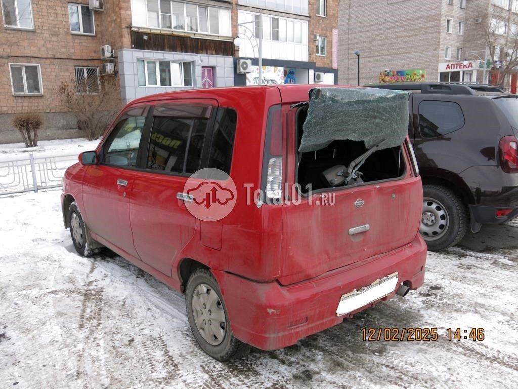 Фото Nissan Cube 8