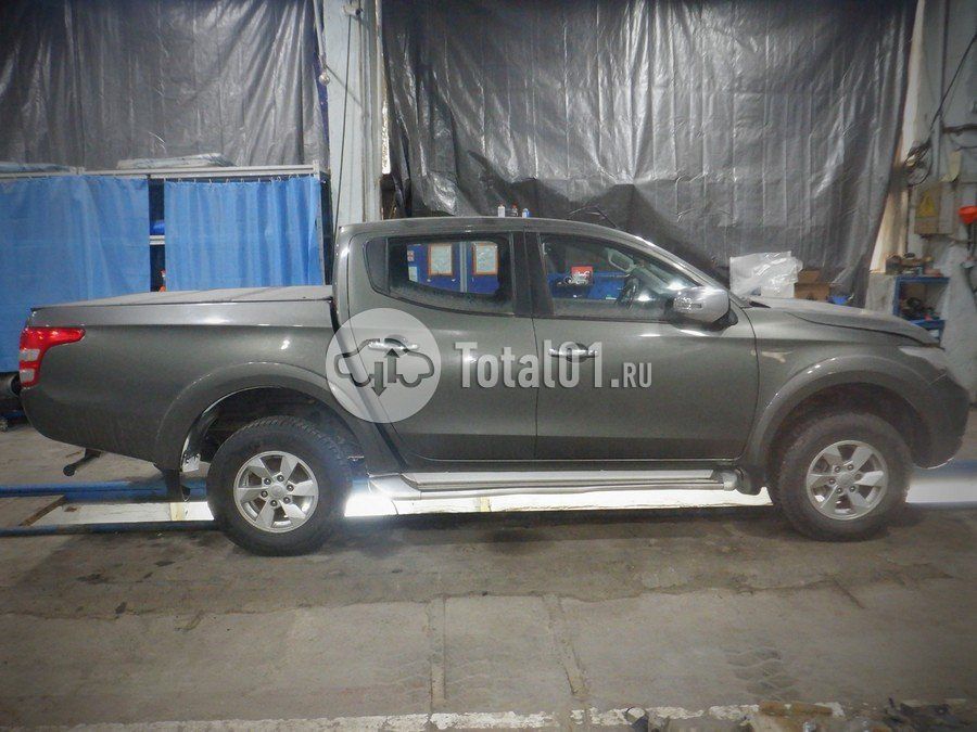 Фото Mitsubishi L200 14