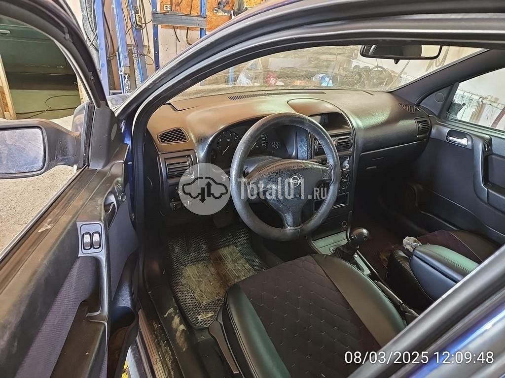 Фото Opel Astra 12