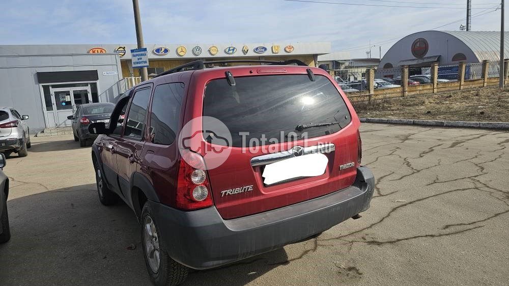 Фото Mazda Tribute 8