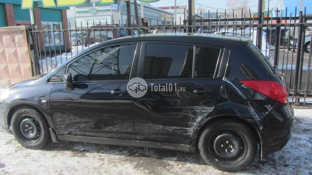 Фото Nissan Tiida 8