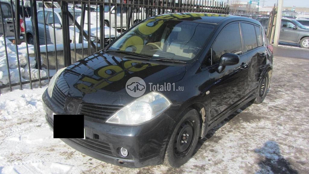 Фото Nissan Tiida 10