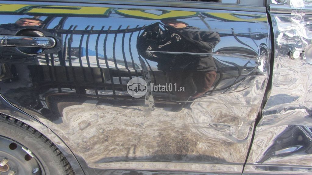 Фото Nissan Tiida 26