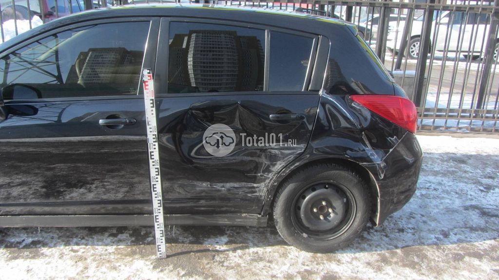 Фото Nissan Tiida 36