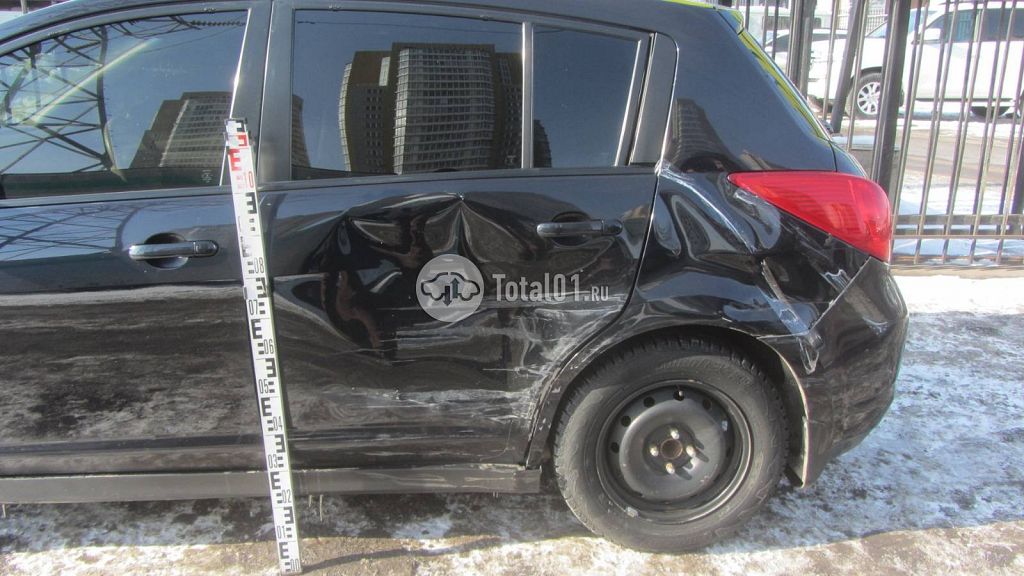 Фото Nissan Tiida 38