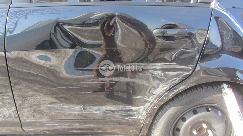 Фото Nissan Tiida 42