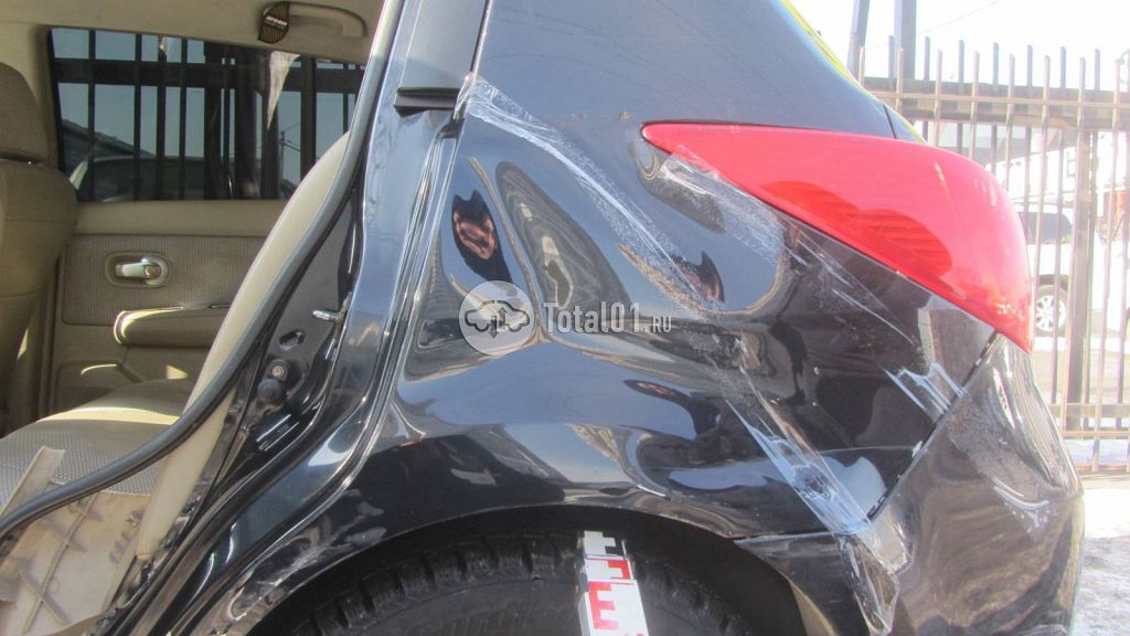Фото Nissan Tiida 52