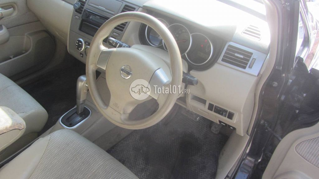 Фото Nissan Tiida 64