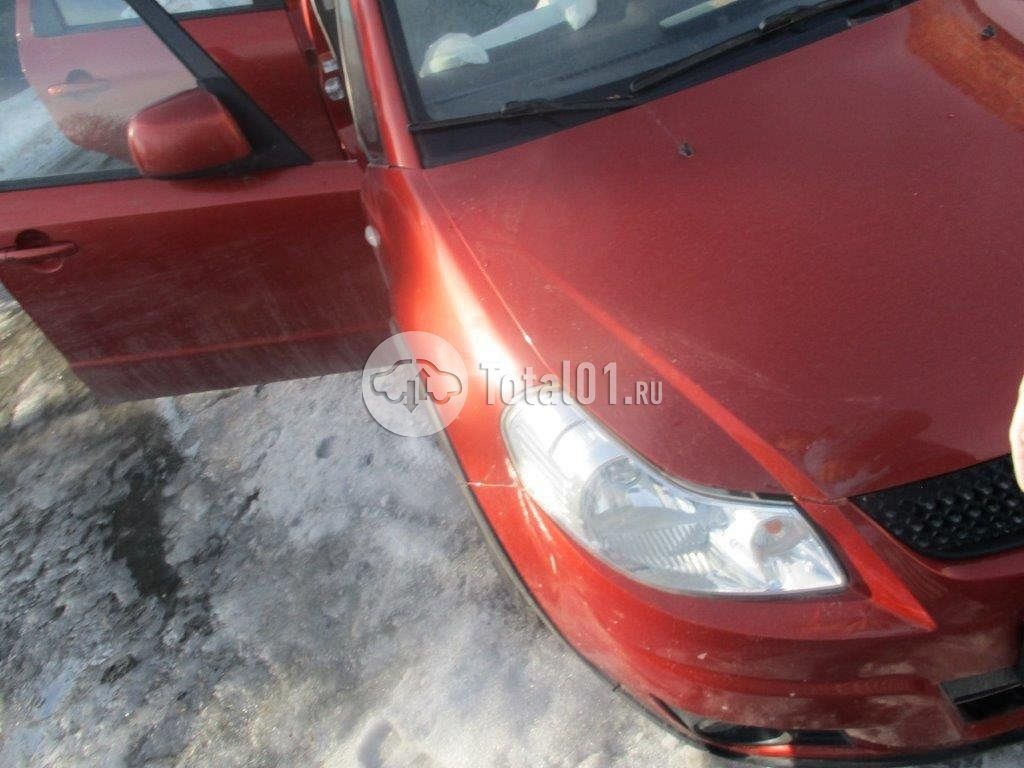 Фото Suzuki SX4 12