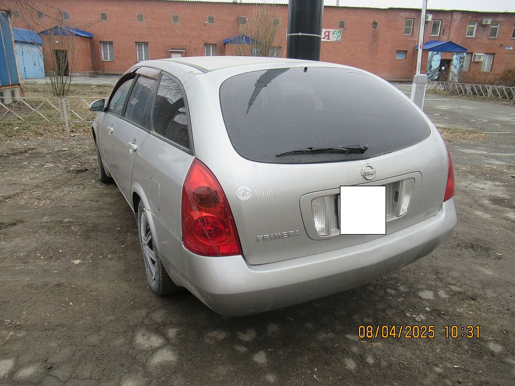 Фото Nissan Primera 8