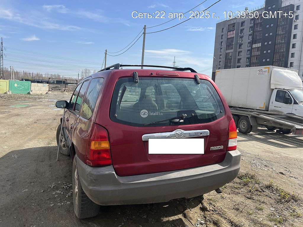 Фото Mazda Tribute 8