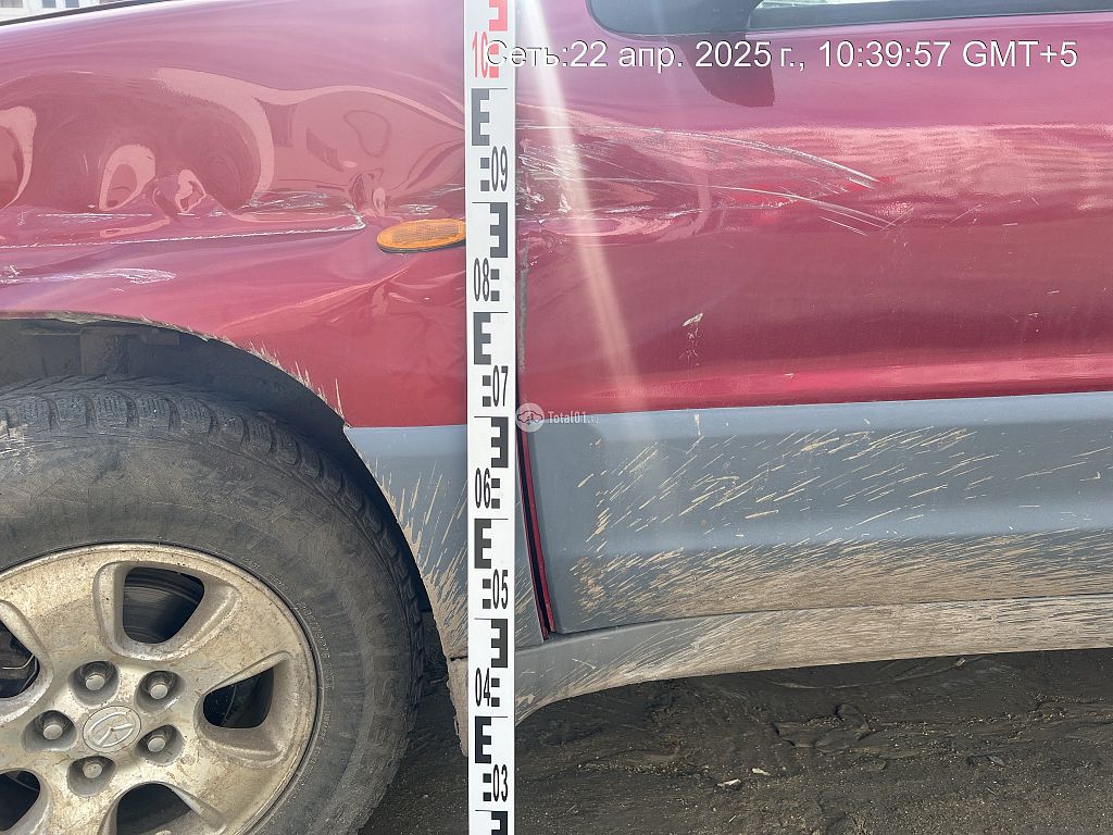 Фото Mazda Tribute 10