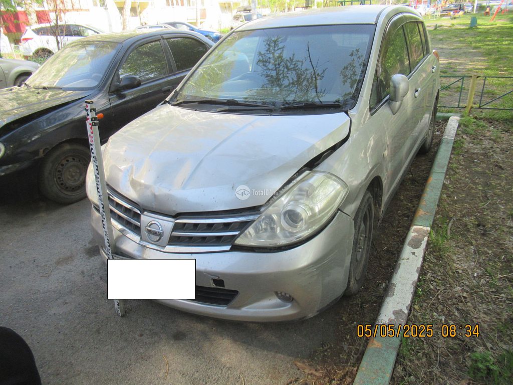 Фото Nissan Tiida 4