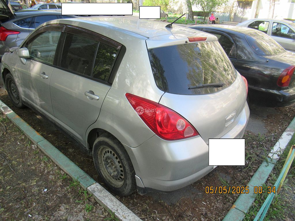 Фото Nissan Tiida 6