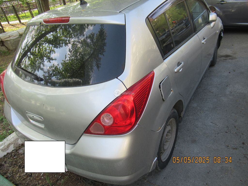 Фото Nissan Tiida 8