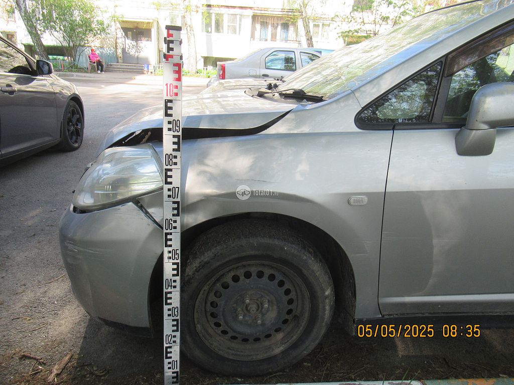 Фото Nissan Tiida 14