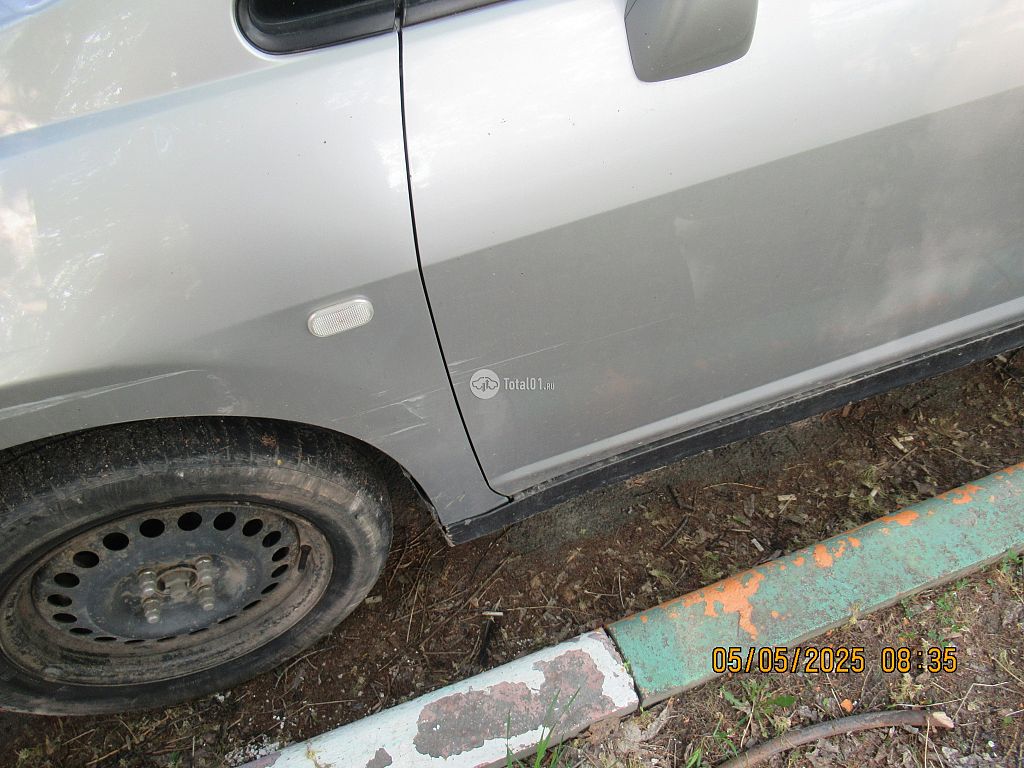 Фото Nissan Tiida 18