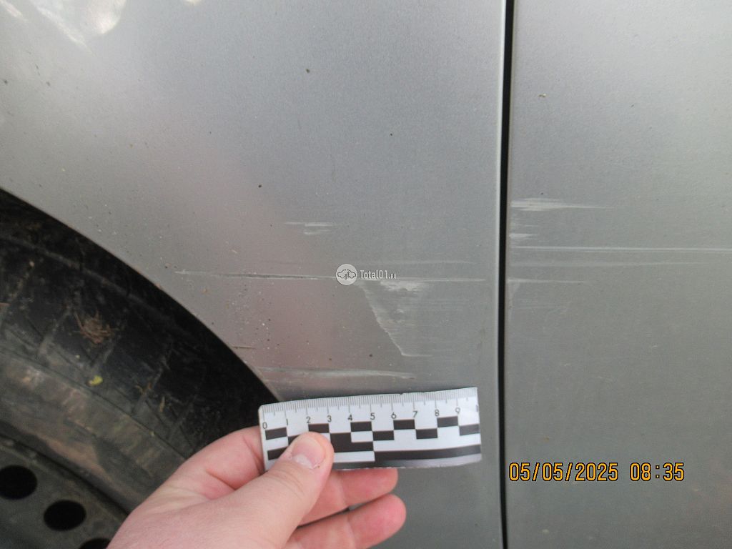 Фото Nissan Tiida 26