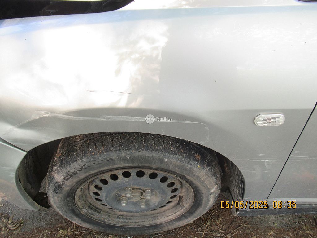 Фото Nissan Tiida 32