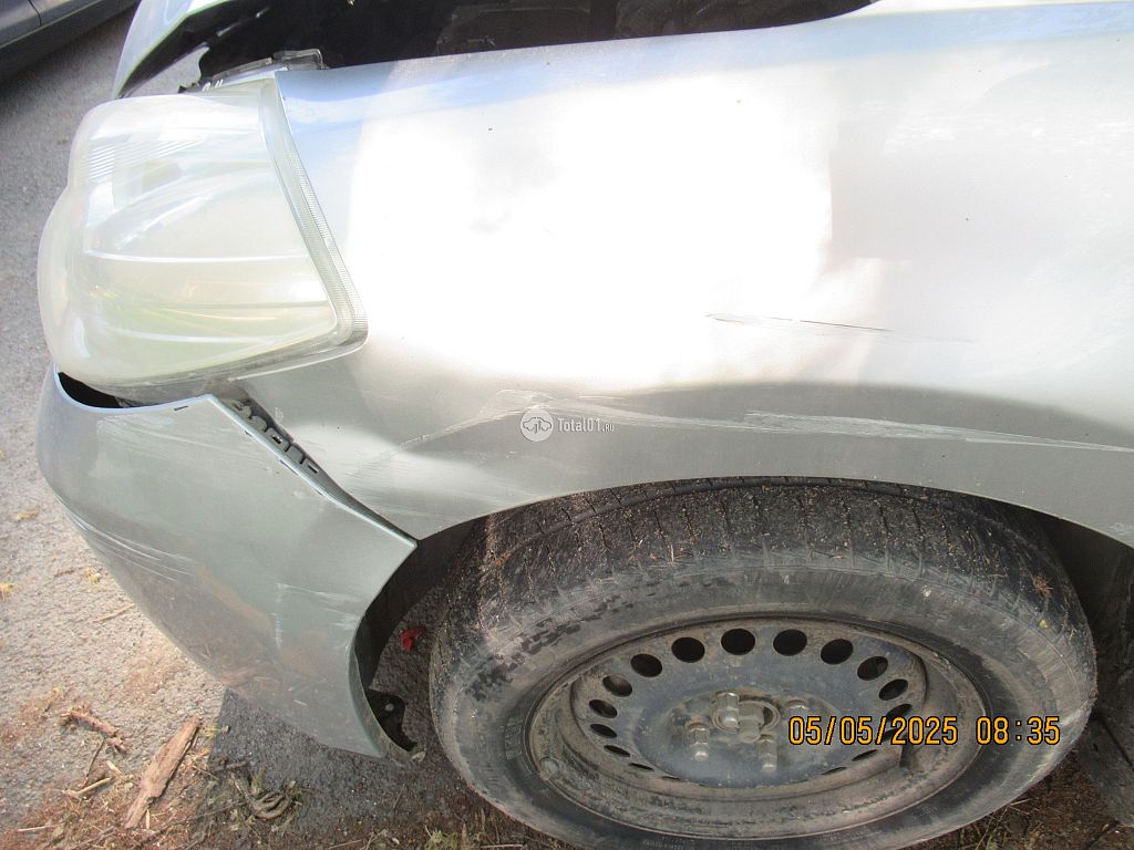 Фото Nissan Tiida 34