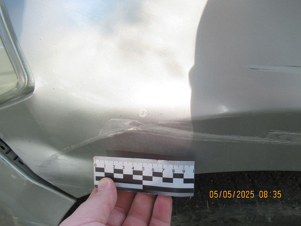 Фото Nissan Tiida 38
