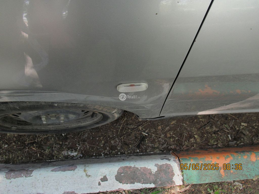 Фото Nissan Tiida 48