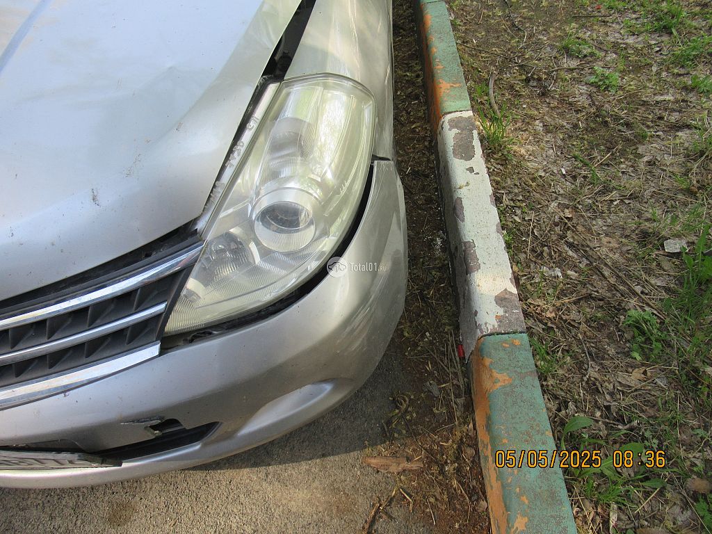 Фото Nissan Tiida 54