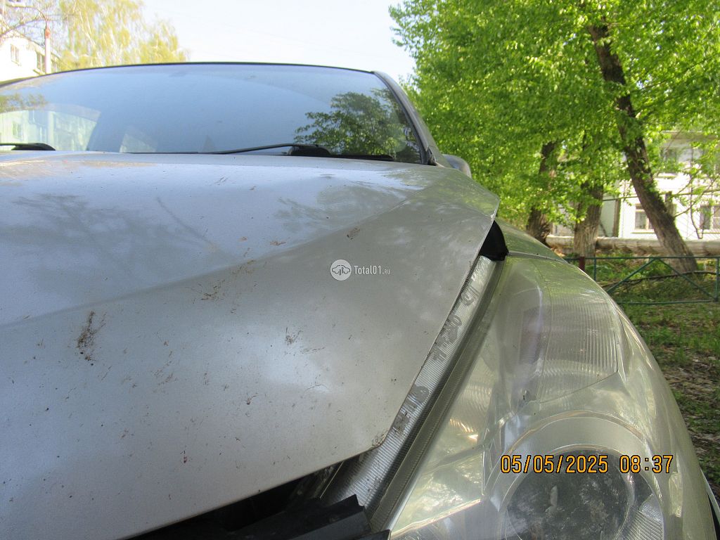 Фото Nissan Tiida 78