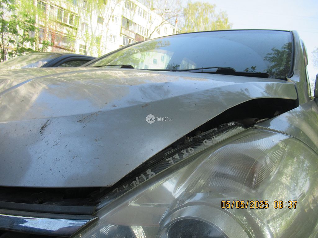 Фото Nissan Tiida 80