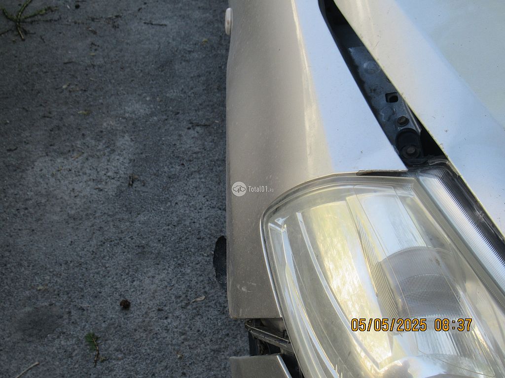 Фото Nissan Tiida 98