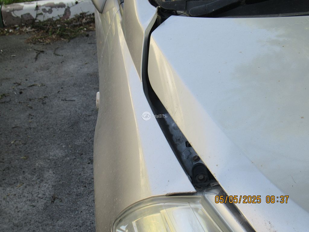 Фото Nissan Tiida 100