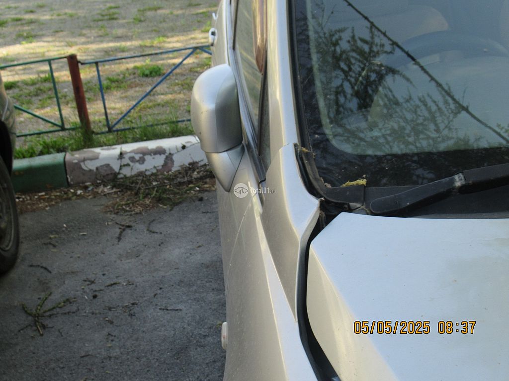 Фото Nissan Tiida 102