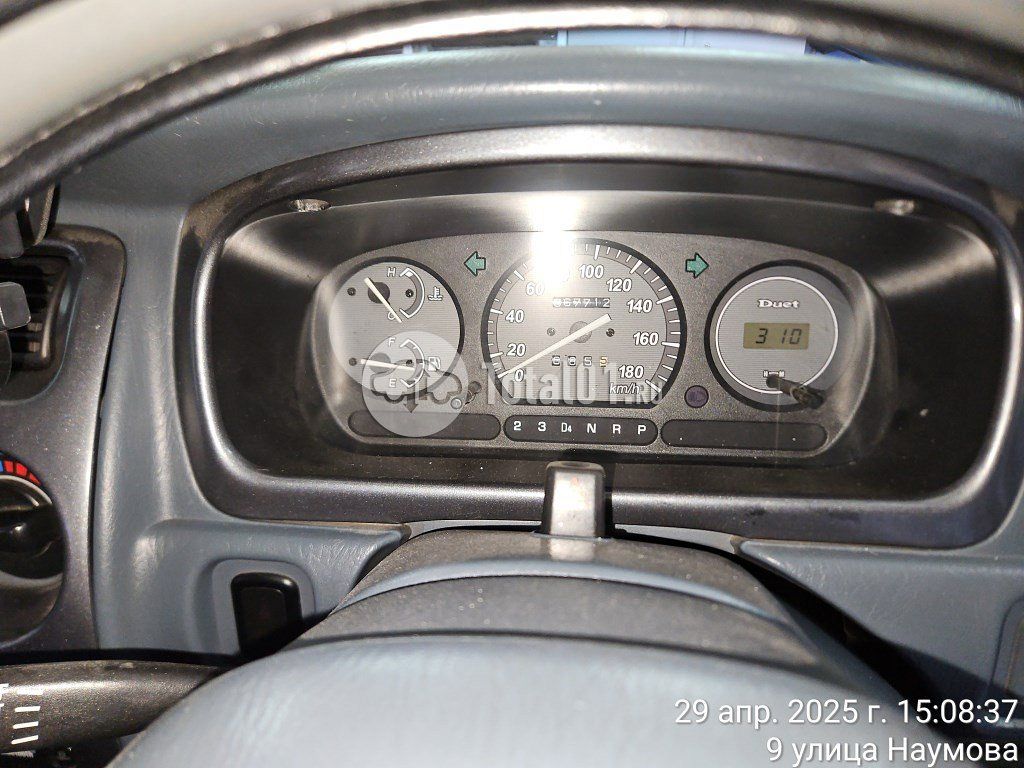Фото Toyota Duet 10