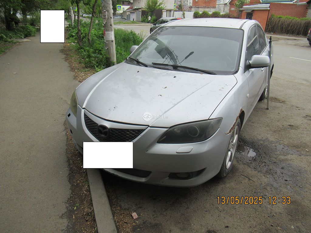 Фото Mazda 3 6