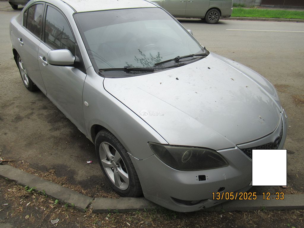 Фото Mazda 3 8